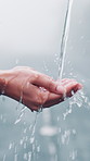 Washing, water and hands of person outdoor for hygiene, wellness and cleaning with mineral liquid. Natural spring, health and palm with splash for hydration, bacteria protection and germ prevention