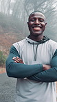 Face, outdoor and black man with arms crossed, exercise and smile with workout, wellness and routine. African person, countryside and healthy athlete with fitness, challenge and morning training