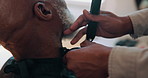 Hands, barber and shave beard with clipper for grooming, maintenance or haircare with client. Man, hair salon or trim with electric tool for beauty, service or hairstylist with customer in barbershop