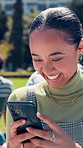 Happy, university and woman with phone on campus for social media, internet and networking. School, education and student on smartphone for online chat, website and funny conversation at college