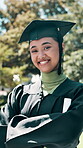 Face, woman and arms crossed for graduation, campus or student with diploma for academic achievement. Outdoor, person and ceremony for education milestone, laugh and happy for certificate at college