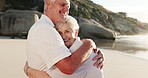 Face, old couple and hug at beach with love for connection, commitment and healthy relationship. Married, elderly people and embrace by ocean with smile for wellness, support and bonding together.