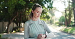 Fitness, woman outdoor or start smart watch for cardio workout, training preparation or wellness. Active, female person or check tech in neighborhood with adjust hair, begin or getting ready for run.