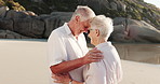 Senior couple, happy and embrace at beach, connection and bonding with love on summer vacation. Elderly man, woman and smile with trust, loyalty or outdoor with care by ocean on holiday in retirement