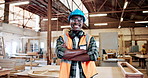 Face, black man and smile with carpenter in warehouse for career pride, about us or manufacturing. Portrait, artisan and arms crossed for furniture production, restoration and remodeling improvement
