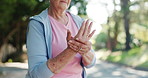 Senior woman, hands and wrist pain with injury for carpal tunnel syndrome, pressure or strain. Elderly, female person or sore arm with arthritis, muscle tension or joint inflammation in neighborhood