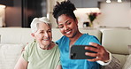 Old woman, nurse and selfie on sofa, happy and hug with bonding, memory and retirement in home. People, caregiver and profile picture with embrace, photography or social media on couch at house