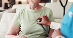 Hands, nurse and stethoscope with old woman at house for heartbeat with breathing assessment. Caregiver, elderly person and medical evaluation for chronic condition, respiratory and listen to asthma
