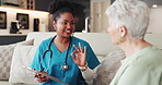 Clipboard, results and nurse with senior woman for consulting, advice and medication schedule in home. Healthcare, document and caregiver with mature person on sofa for discussion and prescription