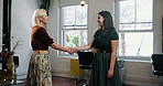 Happy women, interview and hairdresser with handshake for onboarding recruit or business in parlor. Female people, employer and shaking hands with candidate for job, career or hiring in beauty salon