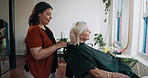 Salon cape, woman and beauty with hair care, professional and grooming with style. Start process, employee or client with conversation, treatment or customer service with wellness, people or makeover
