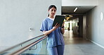 Research, nurse and woman with tablet for healthcare, wellness email and history in clinic. Reading, person and medical worker with technology in hallway, review schedule and scroll hospital records