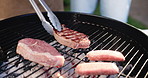 Barbecue, cooking and tongs with people in backyard of home for reunion or social gathering. Fire, food and meal preparation with bbq meat on grill for cookout, get together or hangout outdoor