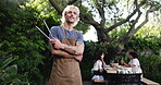 Cooking, bbq and arms crossed with face of man in party for tongs, celebration and social reunion. Barbecue, smile and lunch with person and grill in nature for cookout event, holiday and food