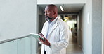 Thinking, serious doctor and black man with tablet for healthcare, wellness and review results. Planning, medical and mature professional with tech for telehealth report or problem solving in clinic