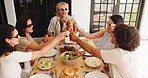 Social gathering, friends and cheers with alcohol, patio and group with food for brunch and reunion. Outdoor, party and toast with liquor on holiday, above and people at home with lunch or together