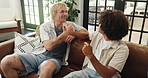 Relax, talking and happy with friends on sofa of home for bonding, social reunion and discussion. Support, connection and chat with men in living room of house for weekend break, gossip and hangout