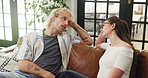 Couple, relax and talk on sofa at house for first date, explain interests and bonding together. People, rest or discussion on couch for commitment, romantic conversation and connection in living room