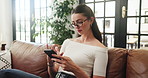 Mobile, scroll and woman in home for relax, communication app or social media profile. Cellphone, reading and person on sofa to check forum, blog post and browsing internet with online search