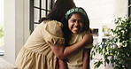 Happy, kiss cheek and mom with child in home for bonding, healthy relationship and affection on weekend. Family, parent and mother with girl embrace for connection, care and love in living room