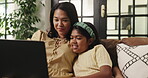 Laptop, love and relax with mother and daughter on sofa for streaming service, movie choice and education show. Film subscription, bonding and online kids series with woman and child in family home