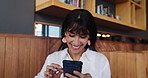 Business woman, phone and laugh in coffee shop for break, social media notification and funny joke. Freelancer, meme and tech with internet for comedy, website or review in cafe for project proposal