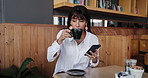 Business woman, phone and smile in coffee break for drink, social media notification and online. Freelancer, research and tech with internet for comedy, website or review in cafe for project proposal