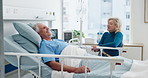 Conversation, support and woman with husband in hospital bed for surgery recovery, healing or treatment. Happy, retirement and senior couple with talking in medical clinic for visit with marriage.