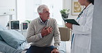 Elderly man, patient or doctor with tablet on hospital bed for health exam or test results. Senior, male person or consulting with medical worker for heart condition, diagnosis or checkup in clinic