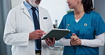 Hands, nurse and doctor with tablet discussion in clinic for EHR system, medical results or advice. People, professional team or digital app with feedback on treatment options or workflow in hospital