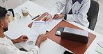 Man, doctor and documents with application for insurance, medical form or survey above in clinic. Top view, male person or patient with healthcare worker or paperwork for health advice or statement