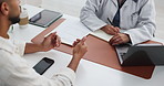 Patient, hands and health advice with doctor writing prescription for medical insurance above. People, client or discussion with healthcare worker or paperwork for diagnosis or results in hospital