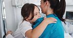 Woman, nurse and hug with child in hospital for affection, medical support and bonding. Healthcare worker, happiness and embrace kid for emotional comfort, compassion and pediatric care for treatment