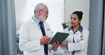 Doctors, team and discussion with tablet in clinic for surgery update, treatment plan and feedback. People, healthcare staff and tech with conversation on health results, workflow schedule or opinion