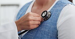 Doctor, hands and woman with stethoscope for breathing, cardiology assessment or respiratory exam. People, medical worker or patient in consultation with lung evaluation, healthcare or monitor heart.