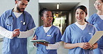 Doctor, healthcare and people in hospital, conversation and teamwork with communication. Professional, group and email service with cooperation, discussion and feedback with diversity and results