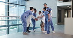 Applause, hand stack and healthcare with medical people in hospital for motivation or support. Clapping, huddle or success with team of doctors and nurses in clinic together for collaboration