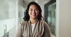 Woman, face and happy at office in corridor with pride, confidence and career at finance company. Person, broker or advisor in portrait with smile for asset management, investing and job in Malaysia