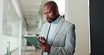 African man, tablet and typing at office with review for investment portfolio at finance company. Mature person, advisor or consultant with contact, report and feedback for asset management at agency