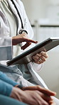 Tablet, healthcare and hands of doctor with patient in hospital for research on diagnosis or treatment planning. Technology, professional and medical worker with person for discussion in clinic.