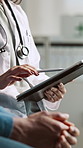 Tablet, discussion and hands of doctor with patient in hospital for research on diagnosis or treatment. Digital technology, stylus and healthcare worker with person for conversation in clinic.