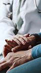 Doctor, patient or holding hands in appointment with comfort, kindness or compassion for diagnosis. Consultation, healthcare worker or people with empathy, support and help for test results feedback.