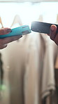 Hands, shopping and phone for payment with pos machine, retail bargain or sales in clothing store. Tap, people or purchase with mobile for customer service, discount or giving fashion bag in boutique