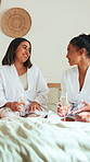 Hotel room, friends and women with champagne at spa retreat, wellness trip and gossip on holiday. Reunion, story surprise and happy people talking on vacation, alcohol and bonding at luxury resort