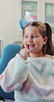 Dentist office, girl or counting teeth with mother for consultation, track dental development or check up. Oral health assessment, woman or child with pride for growth, interactive game or tooth info