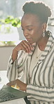 Woman, reading and thinking in office with laptop for marketing campaign, research trends or project. Black person, planning or strategy in workplace with computer, advertising insight or creativity.