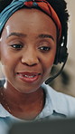 Black woman, talk and headset with laptop at call centre for customer service, helping client and crm. Agent, explain and consulting with online inquiry, virtual assistance and discussion for telecom