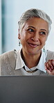 Business, woman and conversation in meeting with laptop for marketing trends, project and research. Mature person, smile and discussion in workplace with computer, advertising insight and planning.
