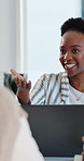 Business, woman and feedback in meeting with laptop for marketing trends, discussion and research. Female person, smile and conversation in workplace with computer, advertising insight and planning.