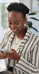 Woman, reading and typing in office with phone for text message, online chat and browse on work break. Black person, smile and scroll with tech for mobile app communication, blog and social media.